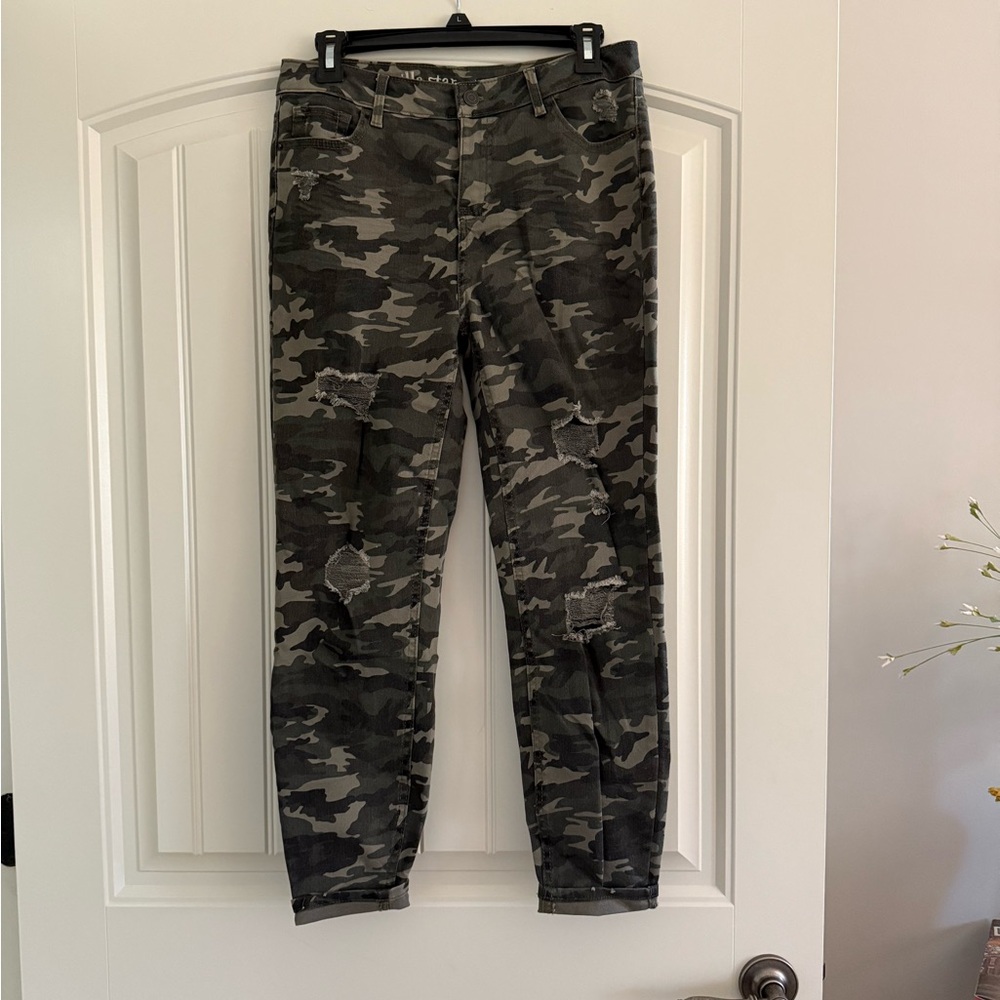 Black and green camo mid rise skinny jeans a with ripped knees